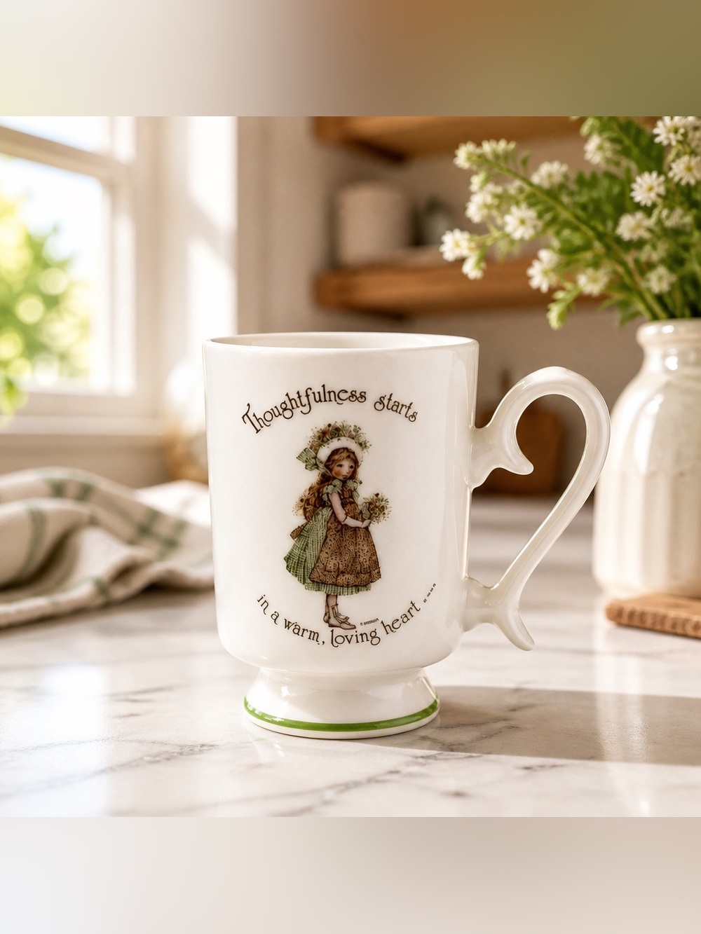 1974 Holly Hobbie porcelain pedestal mug says, thoughtfulness starts in a warm